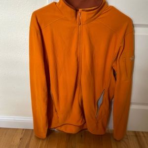 Lightly used Arc’teryx orange jacket (Large)